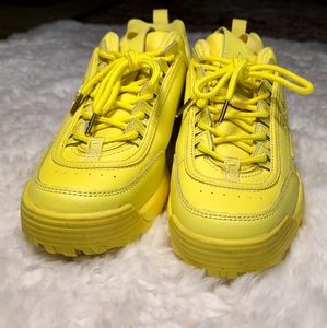 Yellow FILA shoes